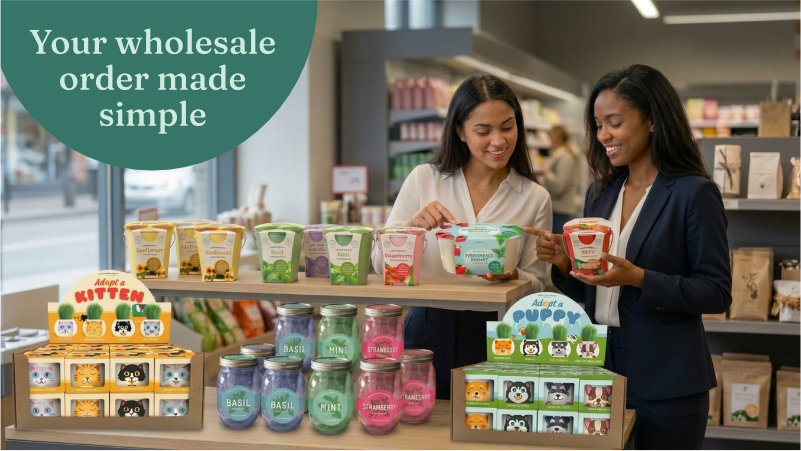 Two retail buyers reviewing a wholesale order of grow kits in a store
